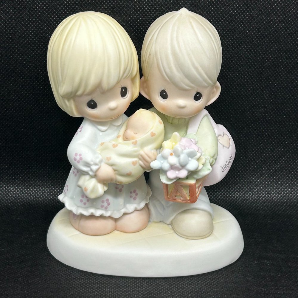 Precious Moments “Blessed With a Miracle" figurine
